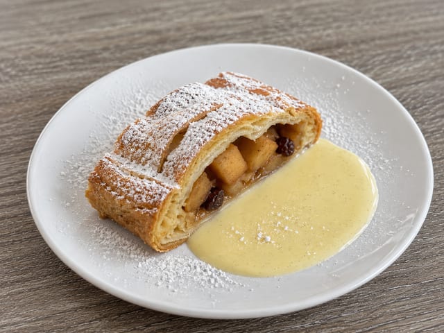 Warm Apple Strudel with Vanilla Sauce.